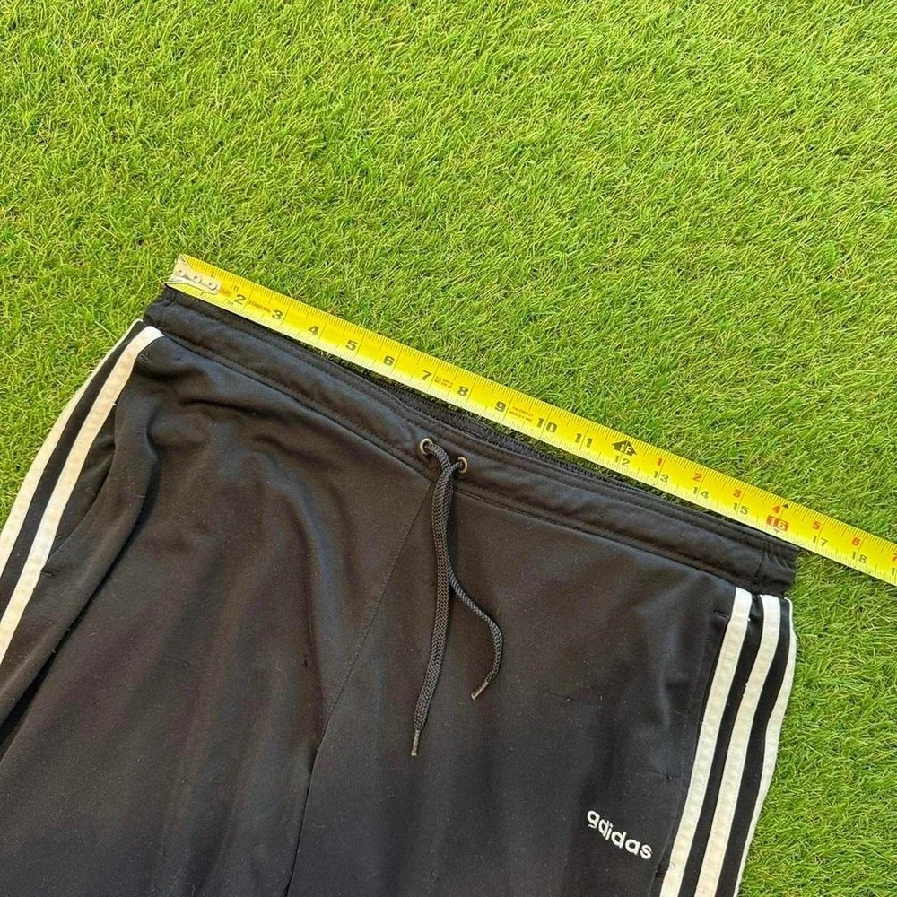 Adidas black sweatpants with white stripes large